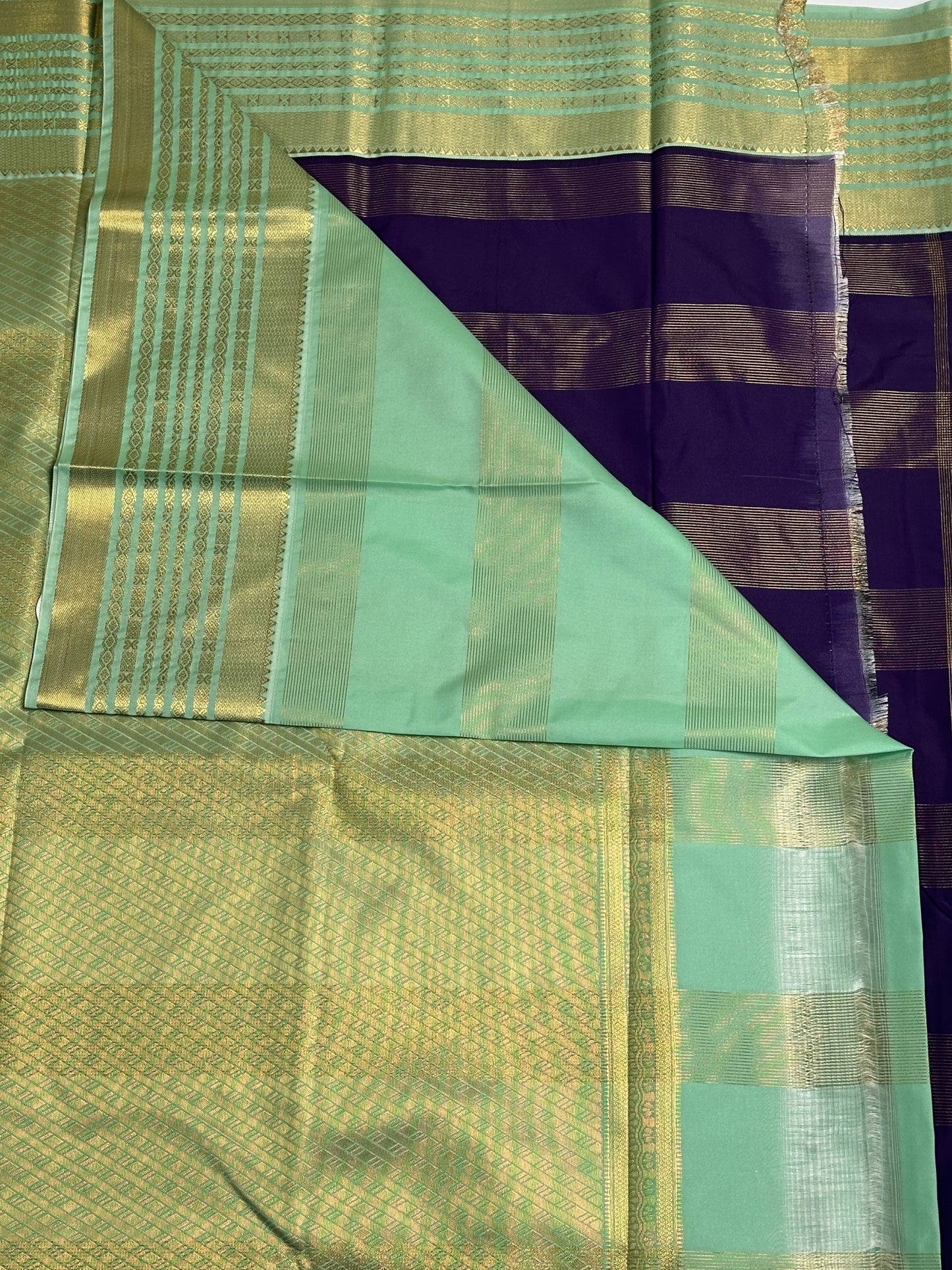 Kanchi Semi silk saree with monotone and golden Zari border pallu