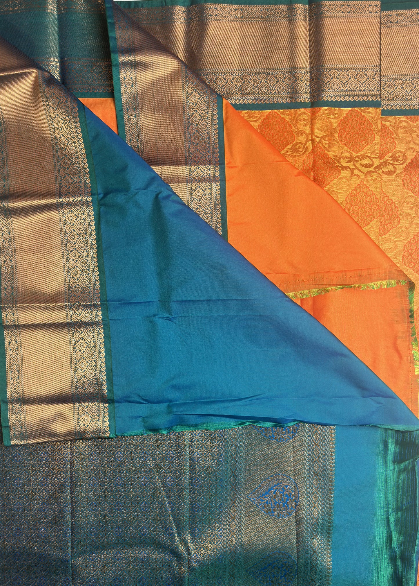 Orange Designed Semi-Silk Saree with Copper Zari and Blue Gradient Border pallu
