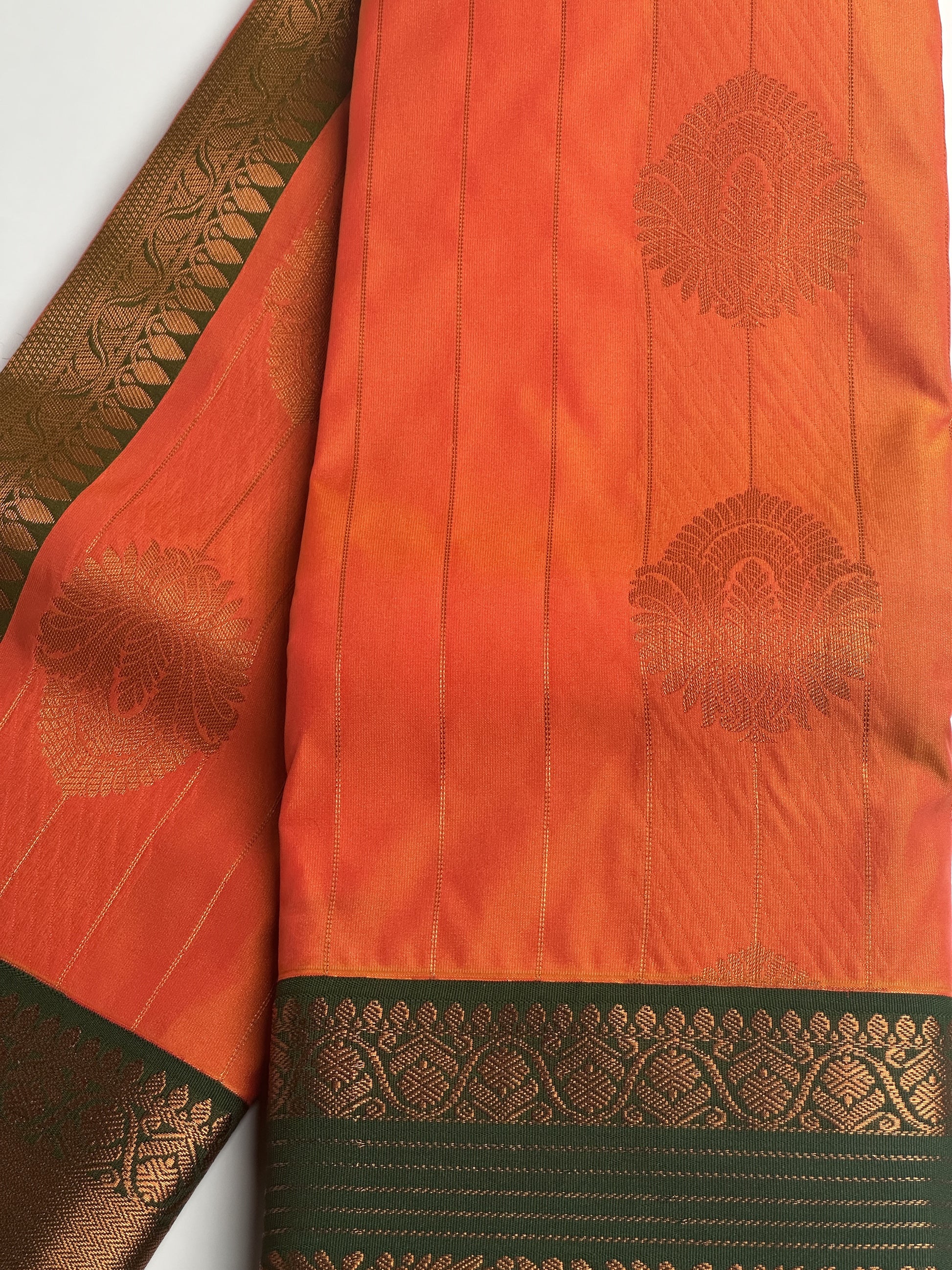 Elegant Orange Striped Semi-Silk Saree with Green Border and Copper Zari Work Design