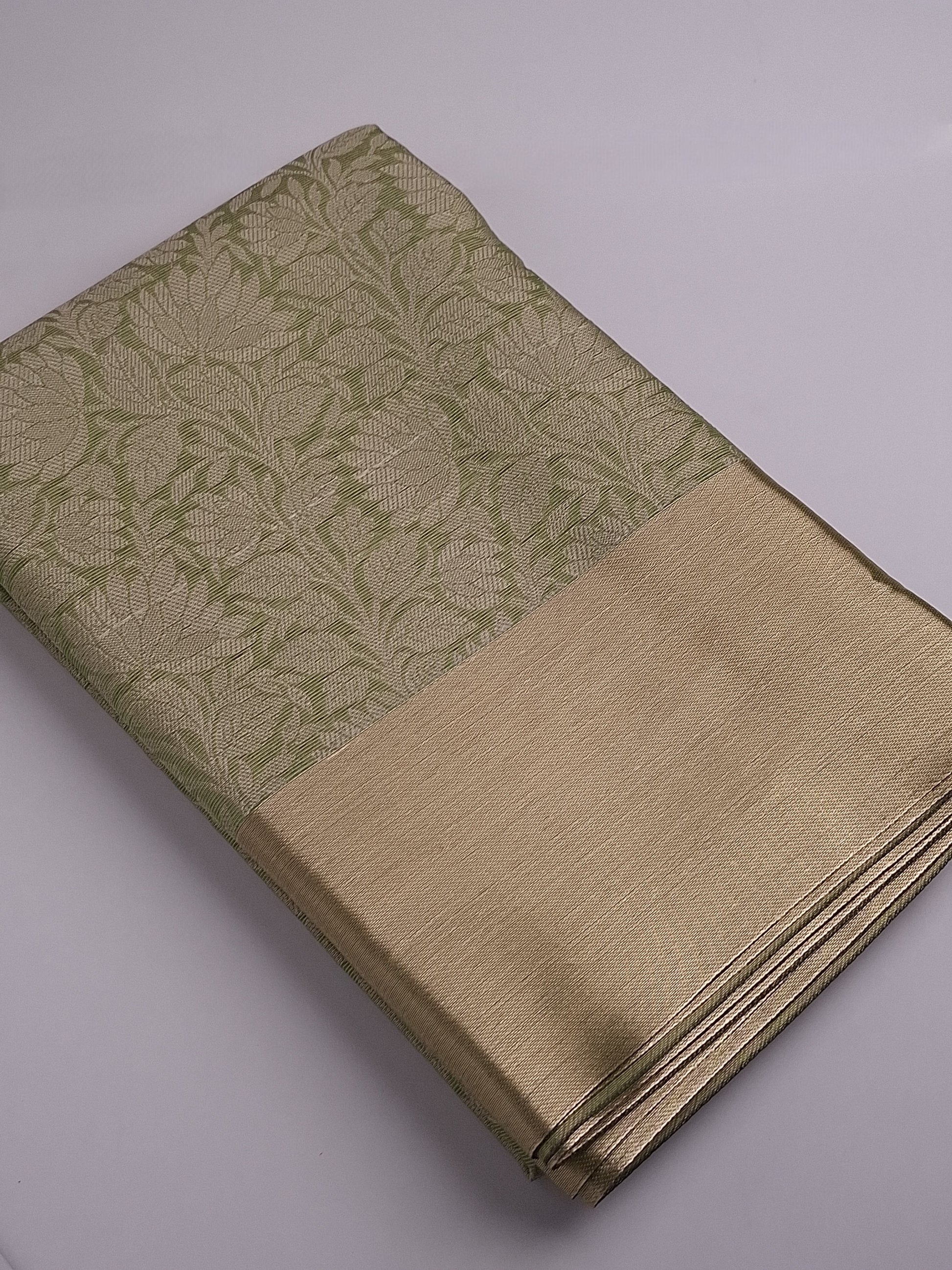 Green Tissue Saree with Elegant Zari Weaving