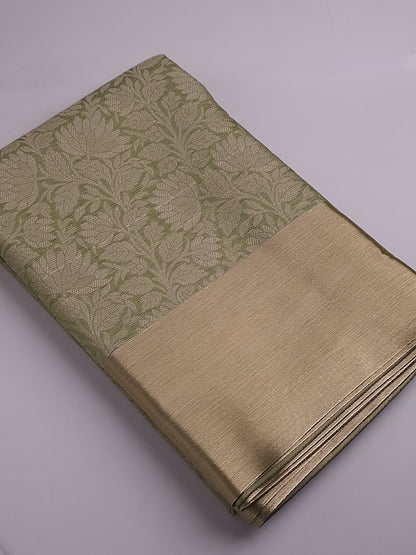 Green Tissue Saree with Elegant Zari Weaving