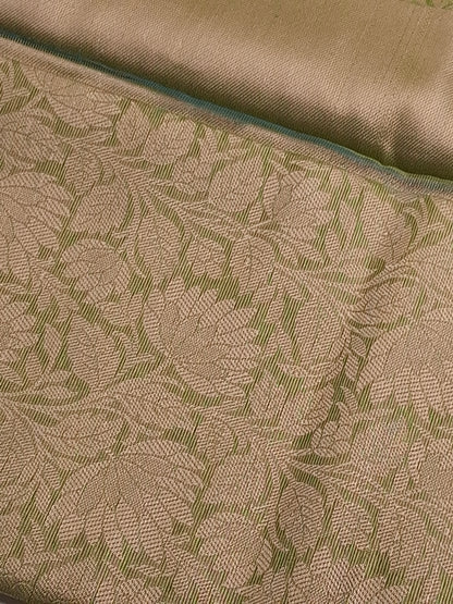 Green Tissue Saree with Elegant Zari Weaving Design