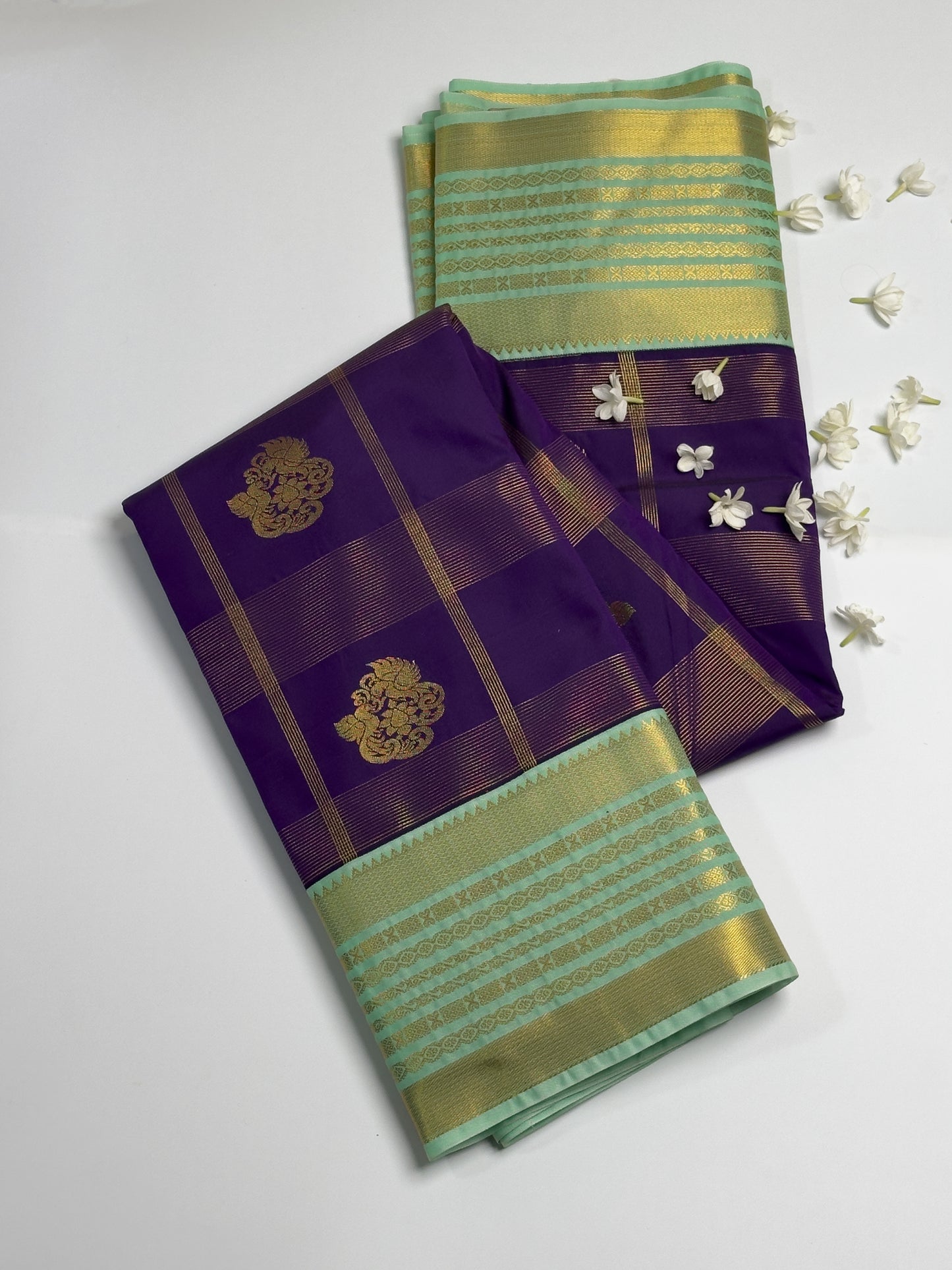 Kanchi Semi silk saree with monotone and golden Zari border Design