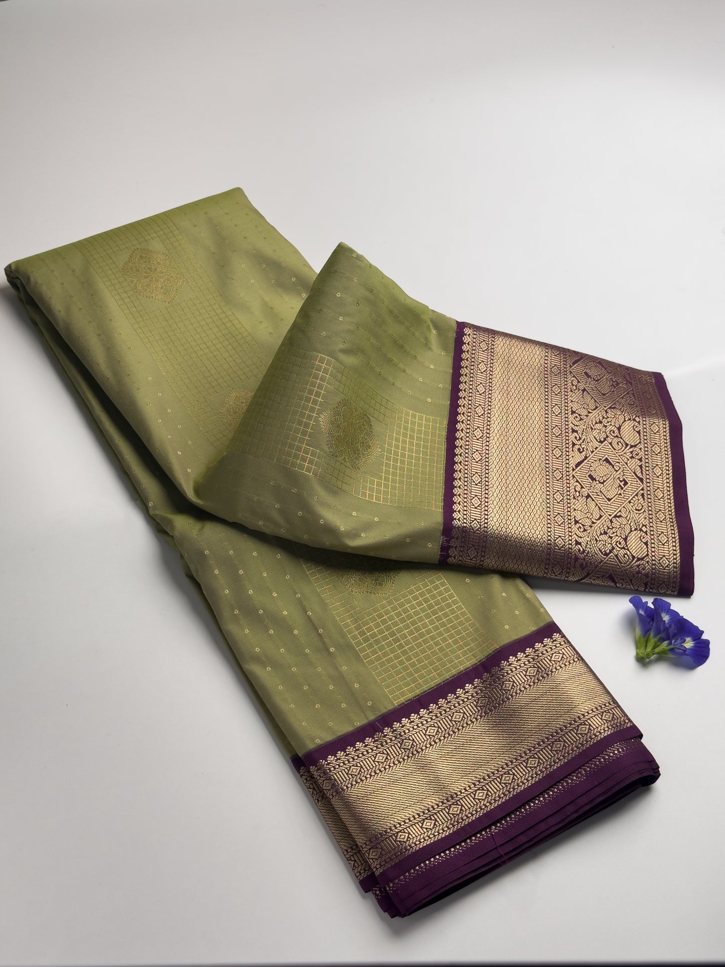 Olive Green Kanchipuram Semi Silk Saree with Purple and Gold Zari Border Design