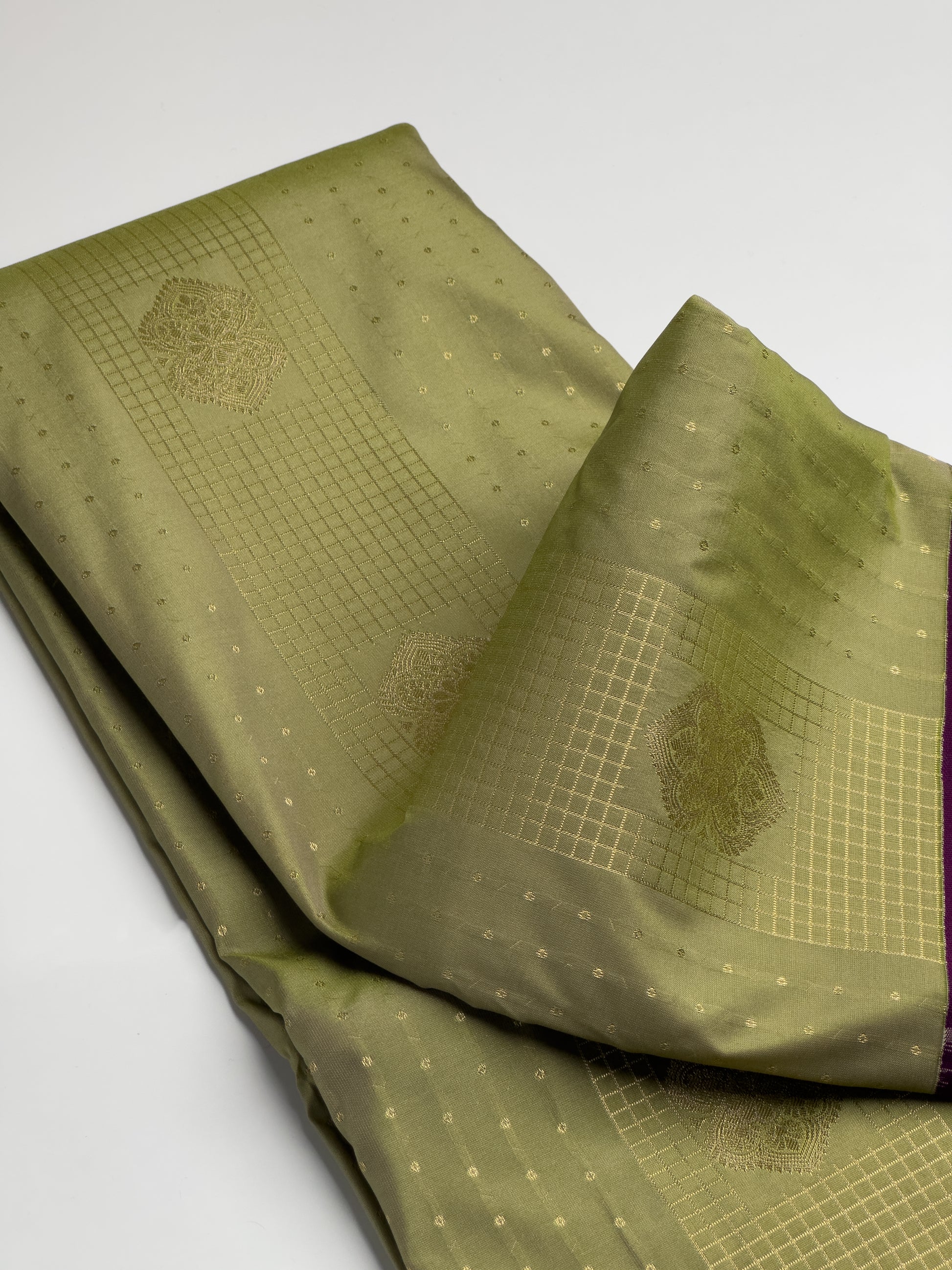 Olive Green Kanchipuram Semi Silk Saree with Purple and Gold Zari Border Designs