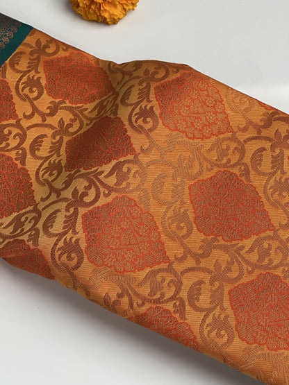 Orange Designed Semi-Silk Saree with Copper Zari and Blue Gradient Border Design