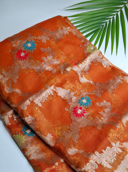 Radiant Orange Banaras Tissue Saree with Gold Borderd Designs