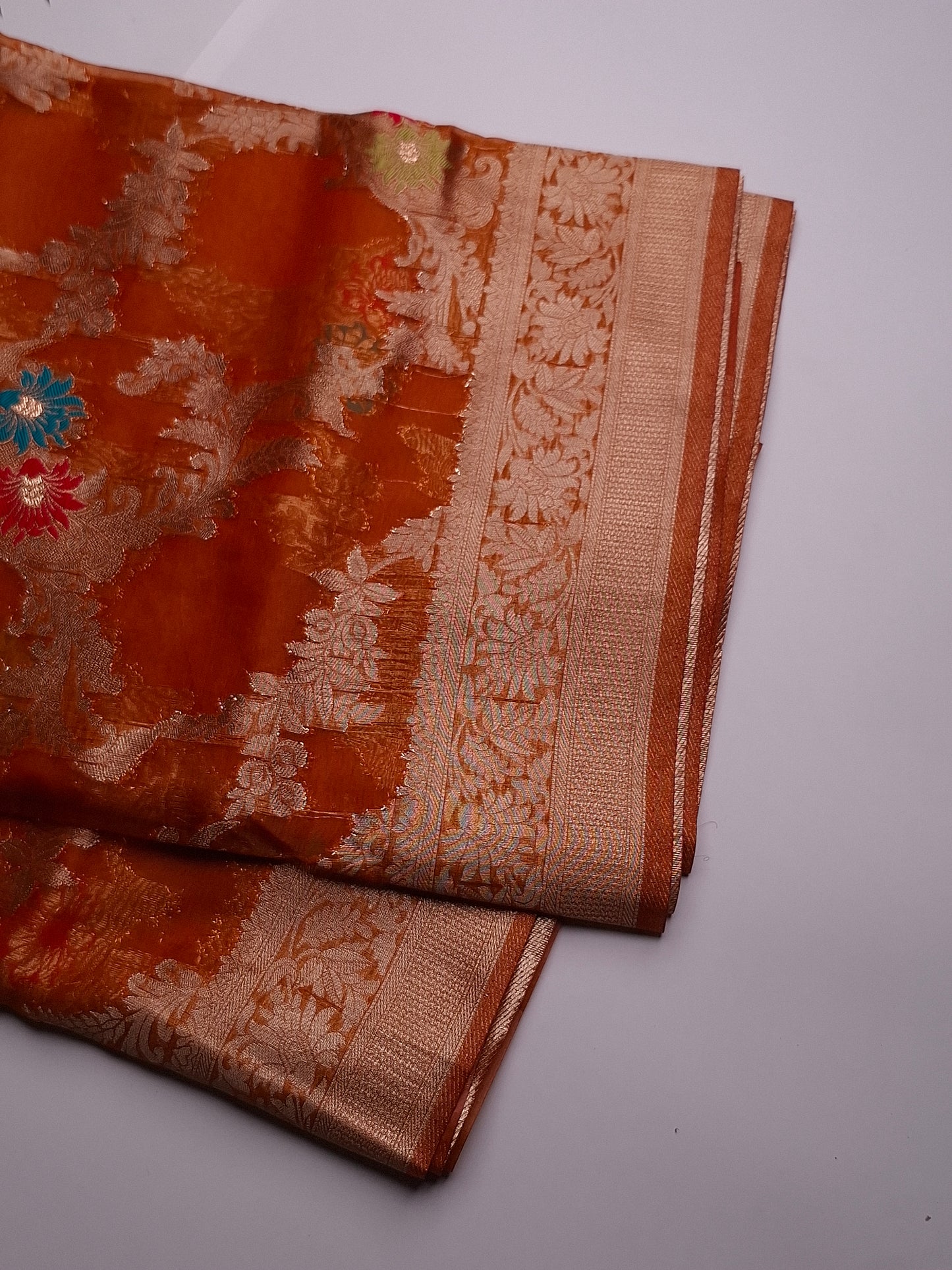 Radiant Orange Banaras Tissue Saree with Gold Borderd Saree