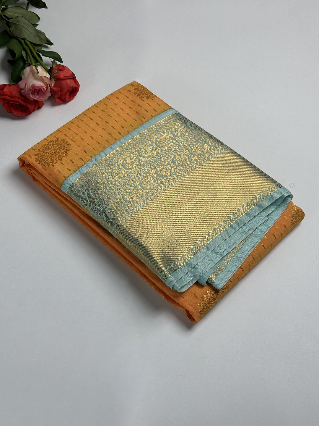 Radiant Orange Semi-Silk Saree with Sky Blue Border & Golden Zari Dotted Floral Design