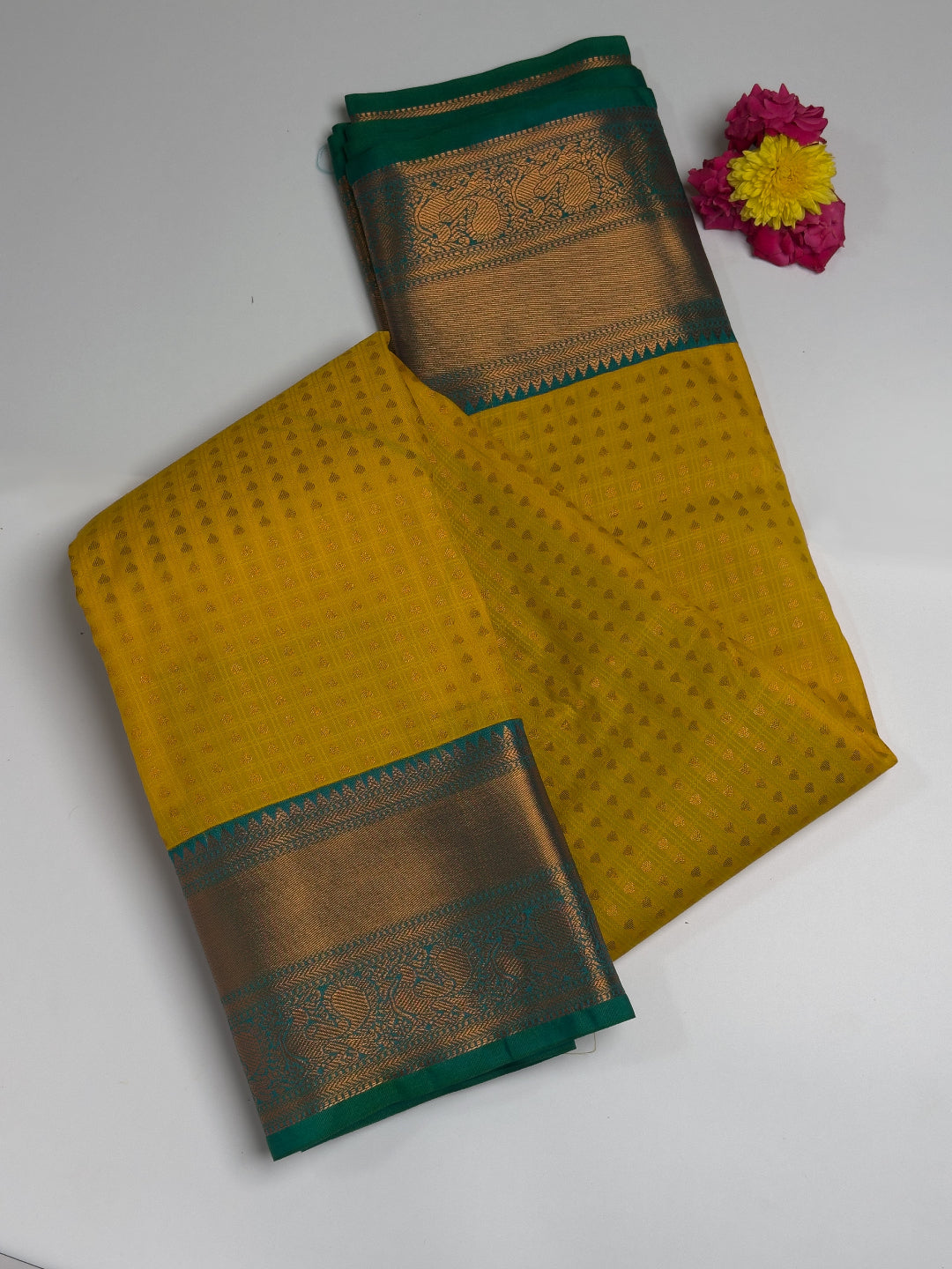 Thousand Butta Yellow Semi Kanchi Semi Silk Saree with Green Copper Zari Border design